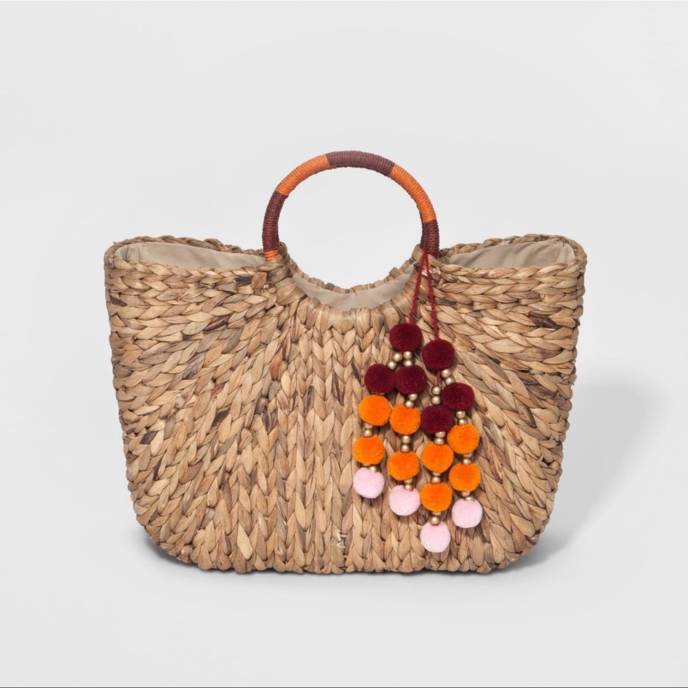 Round straw handle rattan tote bag